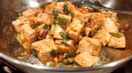 Stir to combine. Add the tofu and carefully stir until tofu is coated with the sauce.